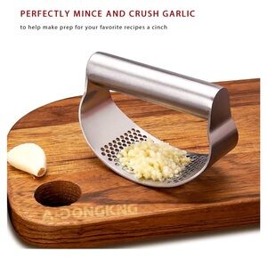 Garlic press,rocker stainless steel new without box